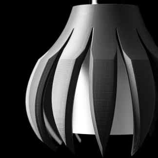 Stylish black and white geometric pendant light for modern interior decor.