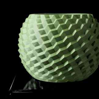 High-quality 3D printed green hexagon textured vase showcasing intricate geometric patterning.