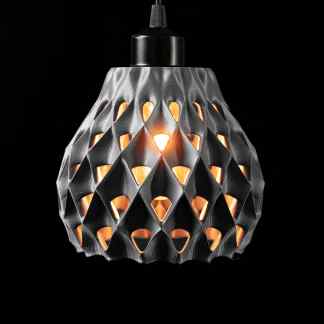 High-quality 3D-printed pendant lamp featuring a modern, geometric pattern with warm lighting effects.