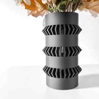 Sleek black 3D-printed vase with geometric cutout patterns for contemporary decor.