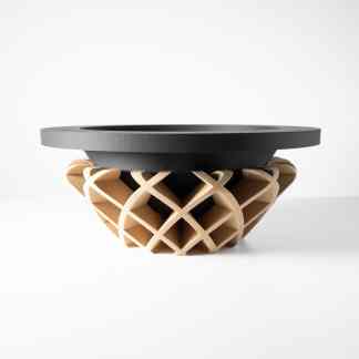 Sleek black and beige 3D printed object showcasing advanced additive manufacturing technology.