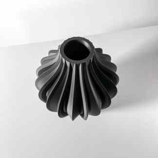Black 3D-printed turbine or compressor wheel for industrial applications.