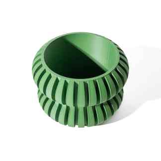 High-quality 3D-printed green ring with vented design, perfect for industrial prototypes and creative projects.