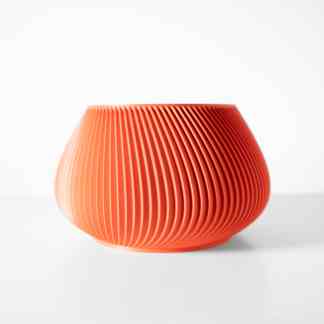 Bright orange 3D printed vase with vertical ridges, contemporary style, perfect for modern interior decoration.