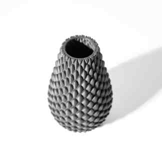 Black textured 3D printed decor vase, modern design for home decor and interior styling.