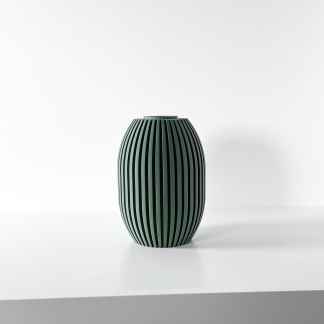 Elegant 3D printed vase showcasing intricate black and green vertical stripe pattern.