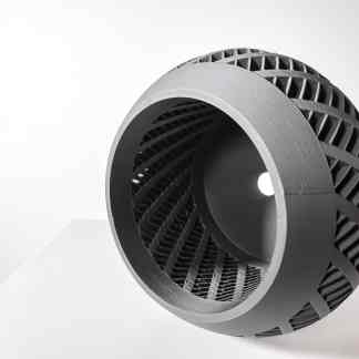 High-resolution 3D printed turbine component with complex lattice structure.