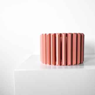 3D printed pink geometric sculpture, modern home decor, and artistic design.