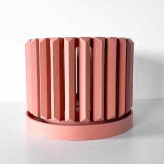 Pink geometric 3D-printed lamp for modern interior decor, art, and stylish lighting solutions.