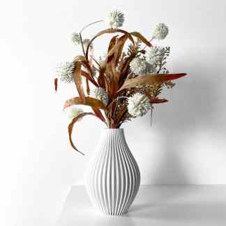 Dry flower arrangement in a white vase, perfect for modern home decor and interior design.