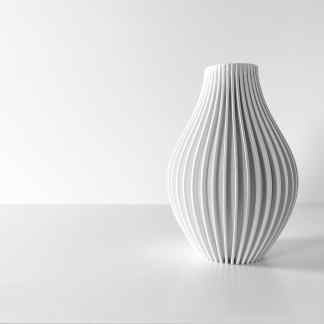 Minimalist white 3D printed vase with sleek ribbed design for modern decor.