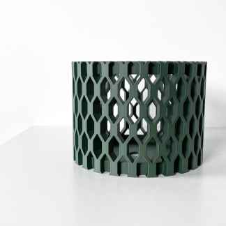 Vibrant green 3D-printed storage basket with honeycomb design for modern home decor.