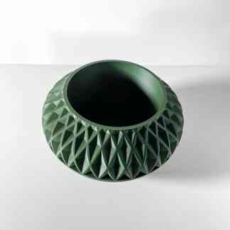 Vase 3D printed in green with detailed geometric design for modern home or office decor.