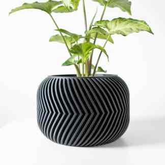 Advanced 3D printed geometric black planter designed for stylish home decor and plant presentation.
