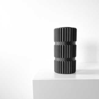 High-resolution black 3D printed gear model showcasing precision and craftsmanship.