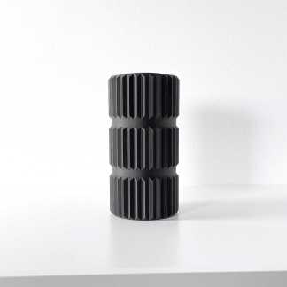 High-quality black 3D-printed gear made with eco-friendly materials. Perfect for engineering and manufacturing applications.