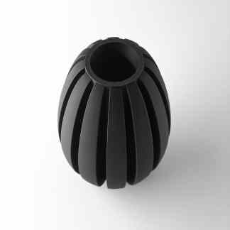 Highly detailed 3D printed black ribbed sculpture for advanced additive manufacturing.