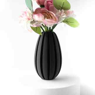 Elegant black 3D printed vase with flowers for contemporary home decor displays.