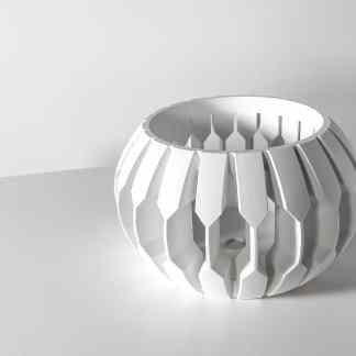 Modern white 3D-printed sculpture with intricate design details.