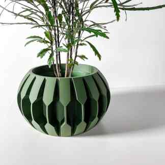 High-quality 3D-printed green vase with a geometric, honeycomb design perfect for indoor plants and modern decor.