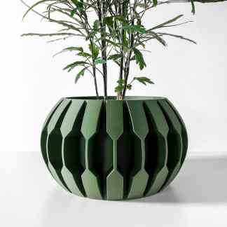 Stylish green 3D printed planter with geometric design, perfect for modern interior plant displays.