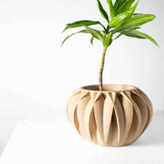 Geometric 3D printed plant pot with unique design, ideal for stylish home and office decor.