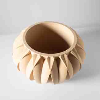 Unique 3D printed ceramic vase with intricate petal pattern.