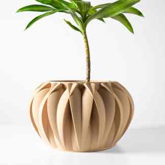 3D printed wooden planter with a lush green plant, showcasing eco-friendly 3D printing and modern home decor.