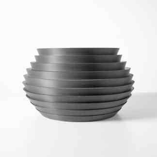 Black layered 3D-printed bowl with smooth, modern design.