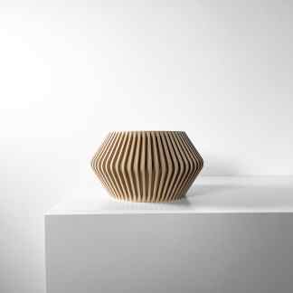 Elegant 3D-printed wooden vase with a contemporary geometric pattern.