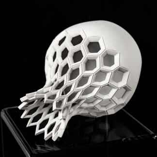 A sleek white 3D-printed sculpture featuring hexagonal honeycomb design for modern 3D printing.