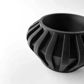High-quality black 3D-printed gear showcasing intricate design and durable material. Perfect for engineering and prototyping.