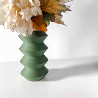 Vase with a unique layered geometric pattern, perfect for contemporary interior decoration.