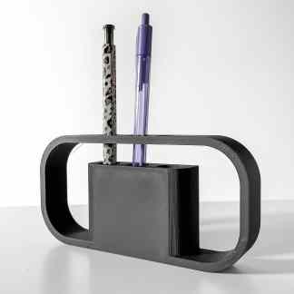 Stylish 3D-printed pen holder with colorful pens, showcasing innovative design and craftsmanship.