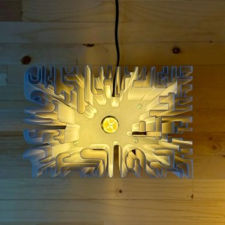 LED wall light with geometric pattern, energy-efficient and modern home or office lighting solution.