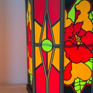 Vibrant stained glass LED lamp with intricate floral and geometric designs, perfect for artistic home decor.