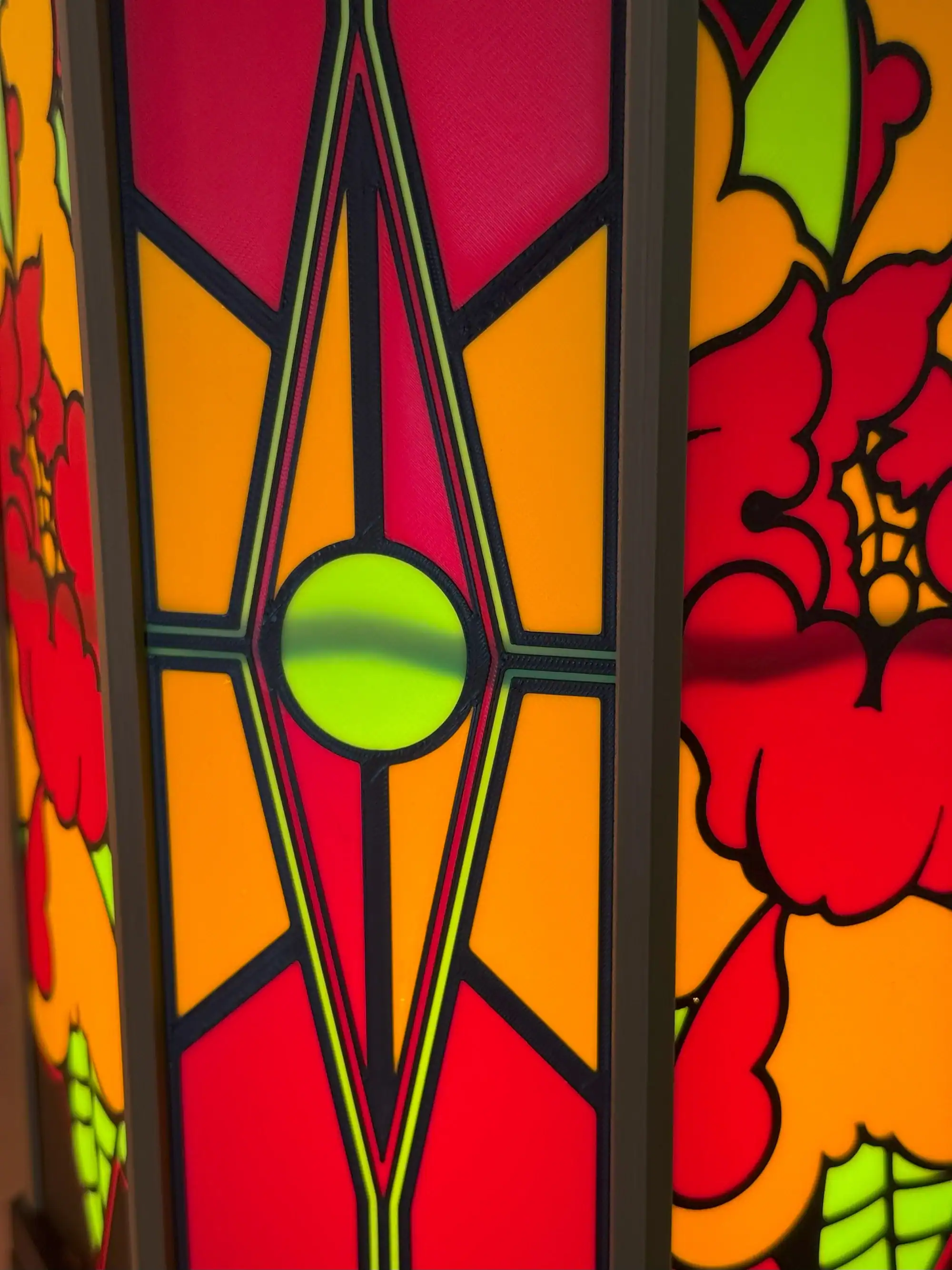 Bright stained glass LED with geometric and floral designs, perfect for artistic home lighting and decor.