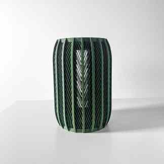 Vibrant green 3D printed sculpture with intricate geometric design, showcasing innovative 3D printing techniques.