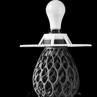 A modern, innovative 3D-printed lamp featuring a geometric design and LED bulb for stylish home lighting.