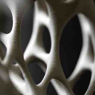 Detailed close-up of 3D printed structure with intricate patterns.