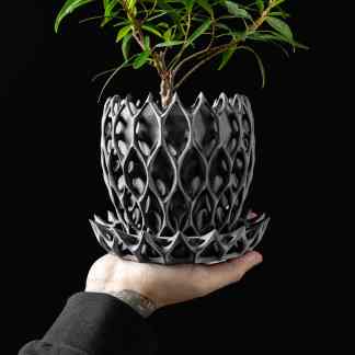Detailed 3D-printed plant pot showcasing complex lattice architecture.