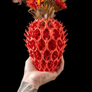 Vibrant 3D printed pineapple flower holder showcasing intricate design and colorful flowers. Perfect for modern home decor.