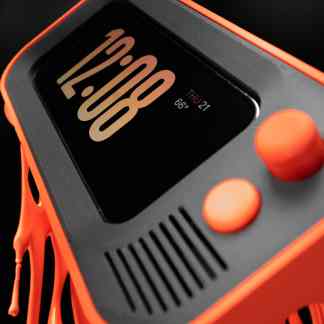 Close-up of a modern digital clock with a black screen and orange frame, displaying time and date.