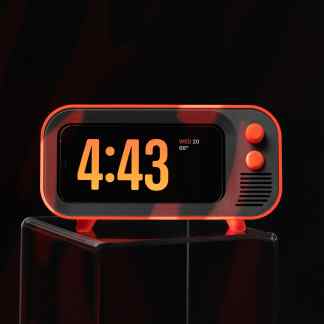 Stylish digital alarm clock with LED screen, modern design, and easy-to-use buttons.