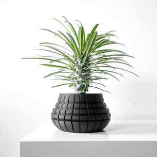 Decorative 3D printed plant pot showing geometric pattern in black on a minimalist white background.