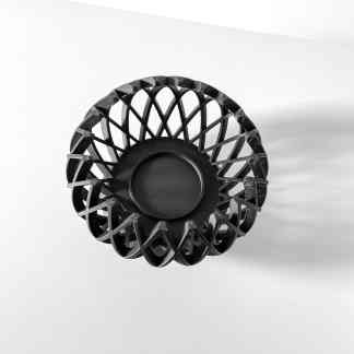 High-resolution black and white image of 3D printed plastic structure with intricate lattice design.