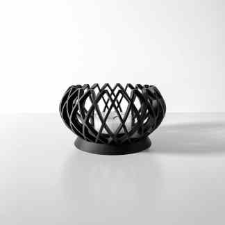 Stylish black 3D-printed candle holder with intricate geometric lattice design for contemporary home accents.