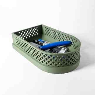 3D printed pen holder with stationery, made using innovative 3D printing technology, for organized workspace.