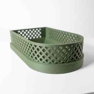 Light green 3D-printed mesh storage basket, showcasing innovative design by AM Square 3D.