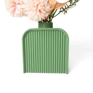 Vase made from sustainable materials with a sleek 3D printed design, perfect for displaying flowers.